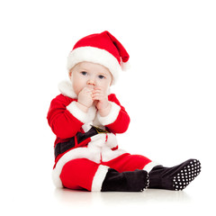 cute kid in Santa Claus clothes