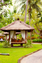 Fototapeta na wymiar Canopies for massage on a beach in Bali