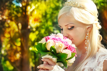 Bride with bouquet in the hands