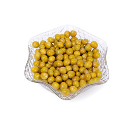 Preserved peas in crystal bowl isolated on a white background