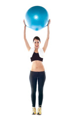 Gorgeous fit lady holding pilate ball