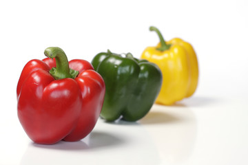 Fresh colorful paprika on a white background