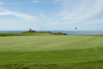 Coast golf green.