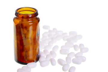 Scattered white pills