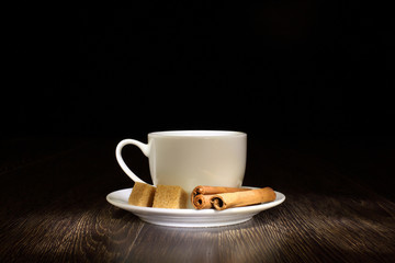 Coffee beans and white cup