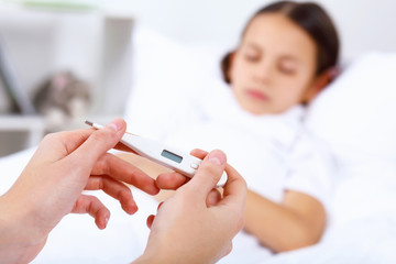 Girl with cold at home