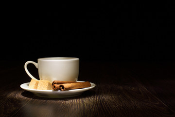 Coffee beans and white cup