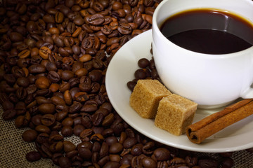Coffee beans and white cup