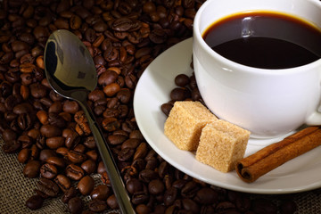 Coffee beans and white cup
