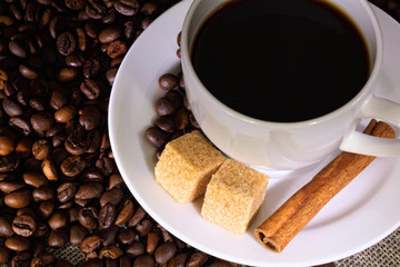 Coffee beans and white cup