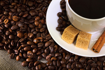 Coffee beans and white cup