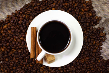 Fototapeta premium Coffee beans and white cup