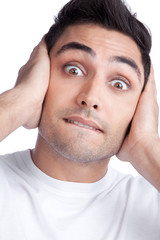 Obraz premium Young Asian Man Covering Ears