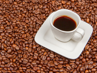 Coffee beans and cup