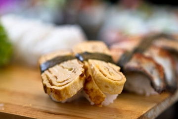 sushi on wooden tray