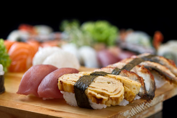 sushi on wooden tray