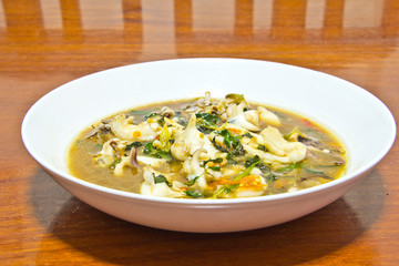 Fried squid with basil.