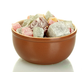 Bowl with delicious turkish delight isolated on white close-up