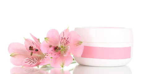 Obraz na płótnie Canvas Jars of cream with flower isolated on white