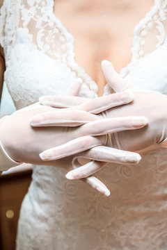 Close-up photo of the elegant hand in glove