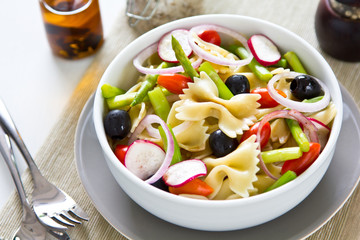 Pasta with asparagus and olive salad