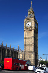 Big Ben with red city bus in London, UK