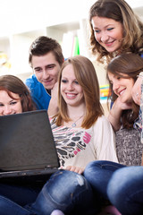 teens students with laptop computer