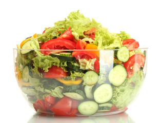 fresh vegetable salad in transparent bowl isolated on white