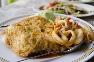 Thai food spicy squid curry on Thai jasmine rice