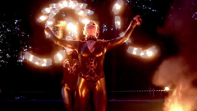 Open air Fire Show at night.