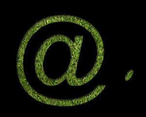 At sign on artificial grass background. Clipping path included