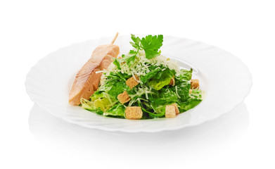 red fish with salad isolated on a white background