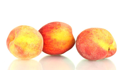ripe peaches isolated on white background