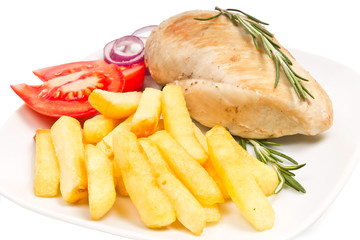 french fries, tomato, chicken fillets and  rosemary