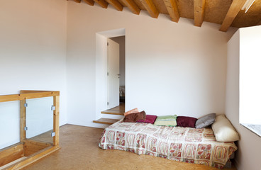view of the room, rural home interior, small bed