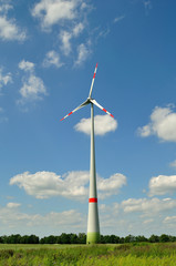 Wind turbine against beatiful sky.