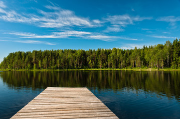 Wooden pier on lake scene