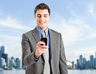 Businessman using his cell phone