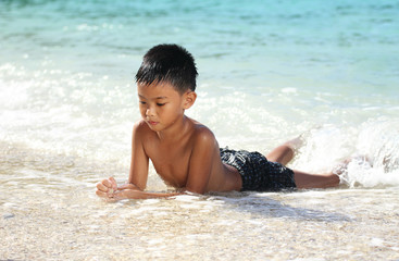 Boy At The Beach