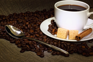 Coffee beans and white cup