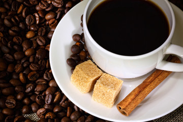 Coffee beans and white cup