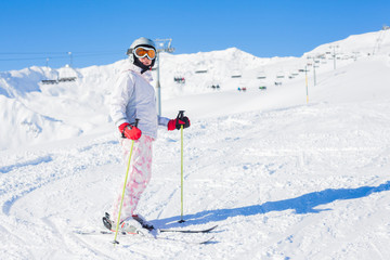 Fototapeta na wymiar Young girl a ski wear