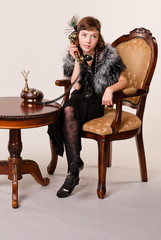 Fototapeta premium A girl dressed as a gangster