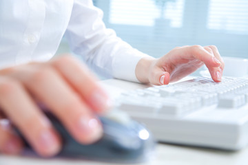 hands on computer keyboard