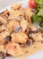 grilled meat with cream and mushrooms