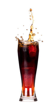 fresh coke splash in glass isolated on white