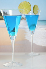 two cocktails on the beach