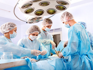 Surgeon at work in operating room. - 42703636
