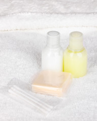 Hotel amenities kit on towel