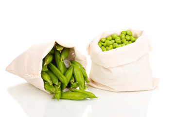 Green peas in bag isolated on white
